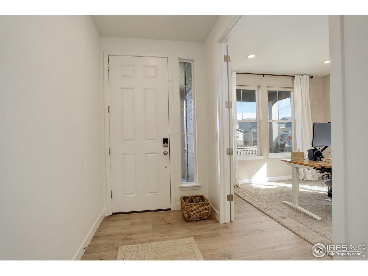 1881 Miranda Road Erie, CO 80516 - Photo 5 of 36 Inviting sunlit entryway