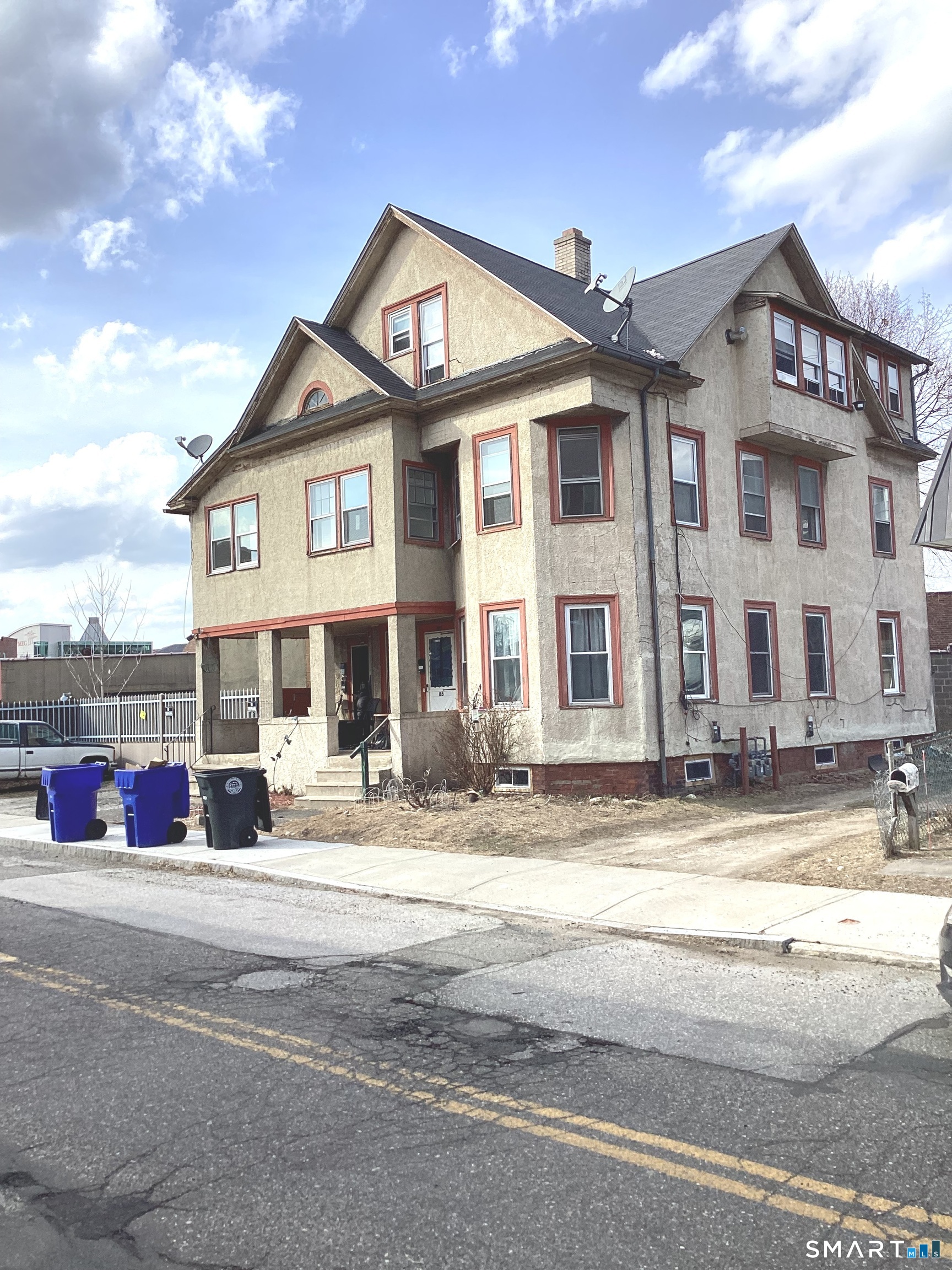 a view of a building with a street