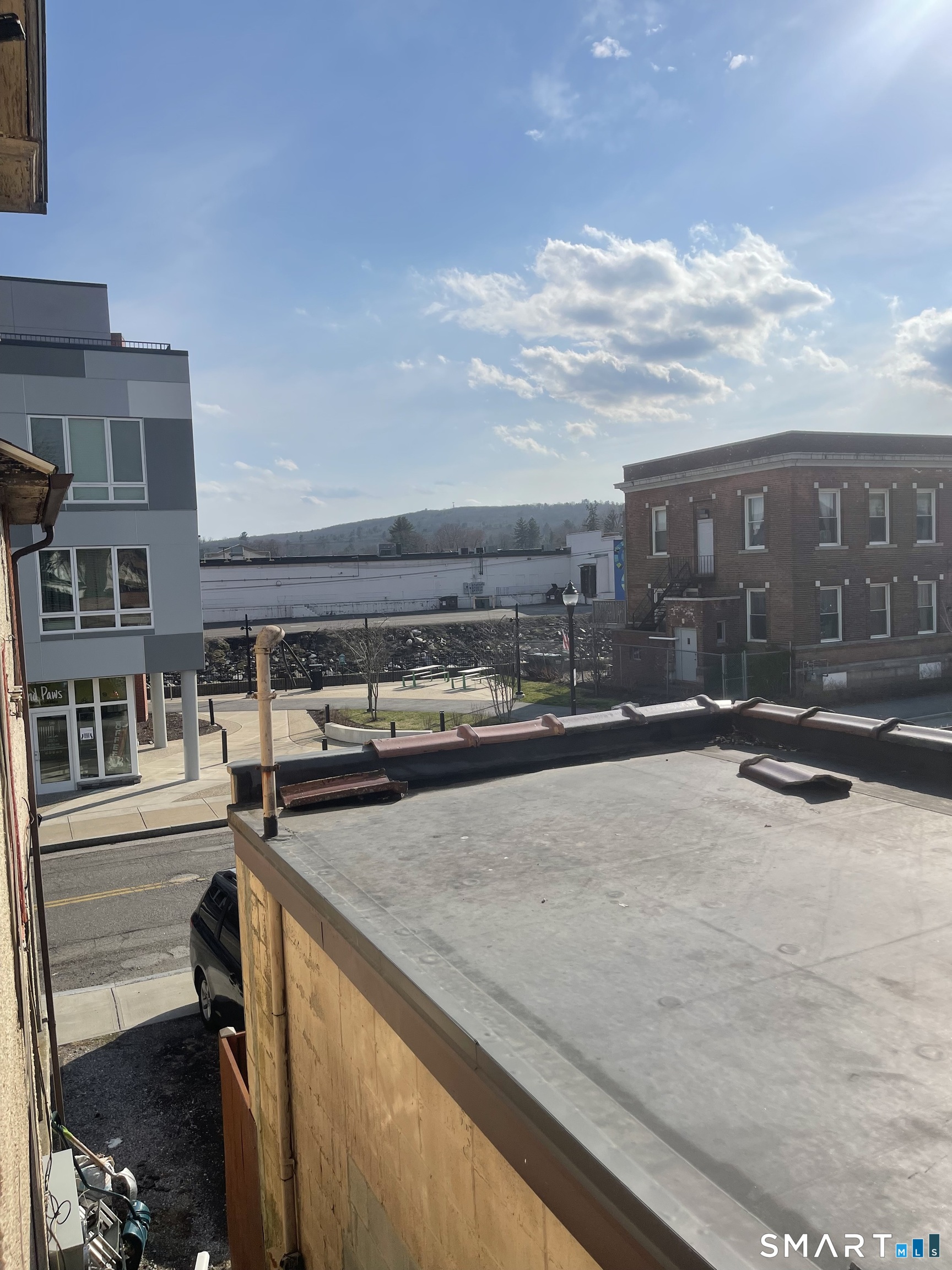 85 Franklin Street Torrington, CT 06790 - Photo 18 of 21 a view of a street with cars