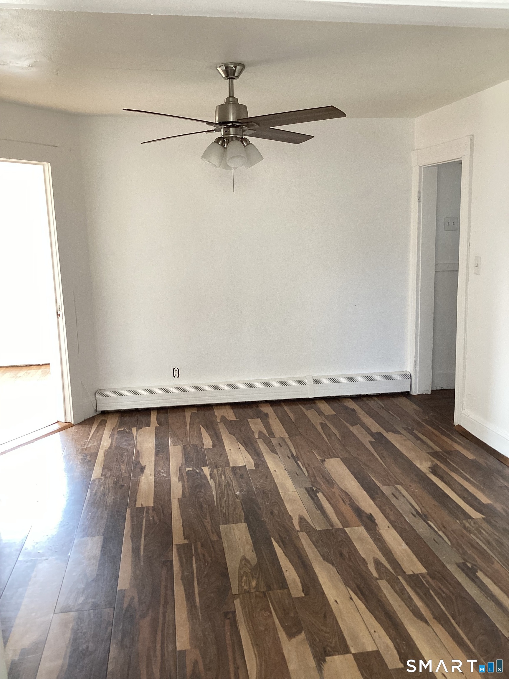 85 Franklin Street Torrington, CT 06790 - Photo 8 of 21 a view of a room with wooden floor