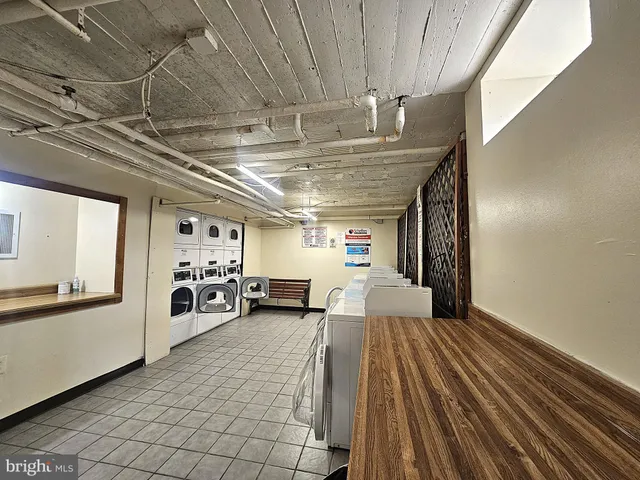 a view of a hallway with stairs