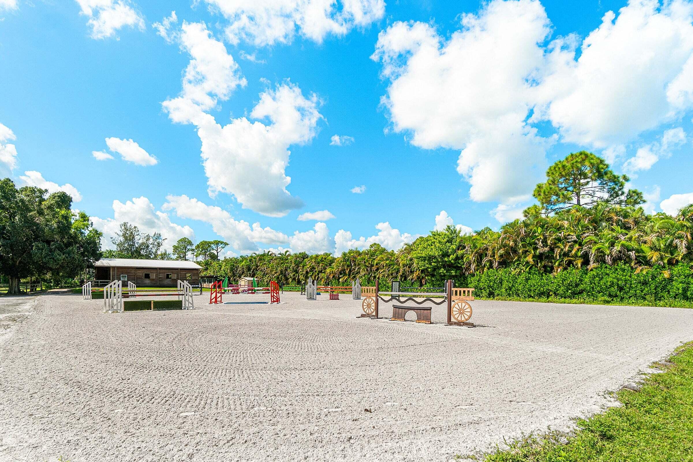 3479 D Road Loxahatchee Groves, FL 33470 - Photo 4 of 12 a park view with a bench