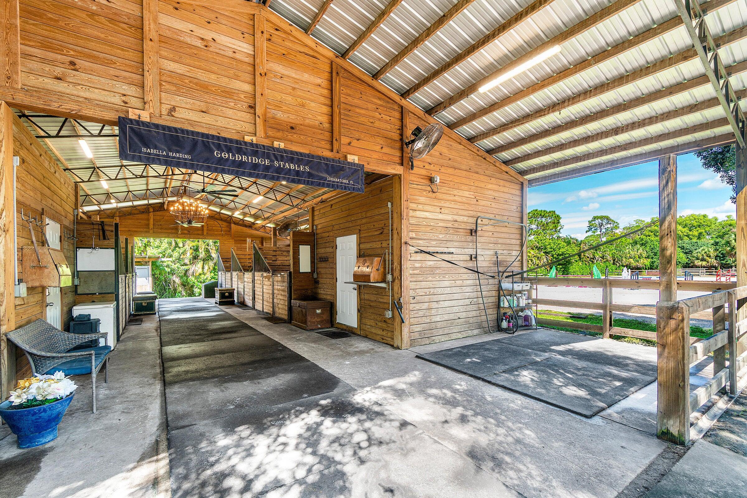 3479 D Road Loxahatchee Groves, FL 33470 - Photo 7 of 12 a view of a porch with furniture