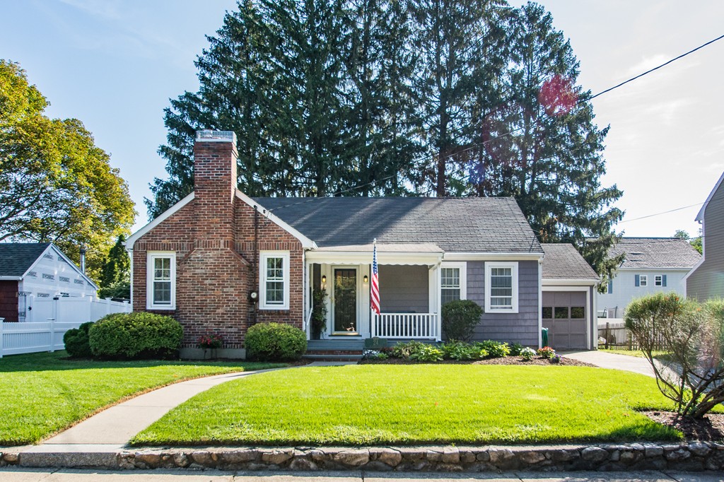 24 Murray Road Newton, MA 02465 - Photo 1 of 30 a front view of a house with a yard