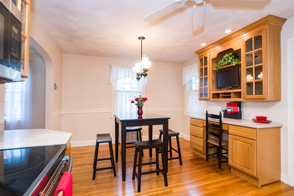24 Murray Road Newton, MA 02465 - Photo 17 of 30 a dining room with furniture and wooden floor
