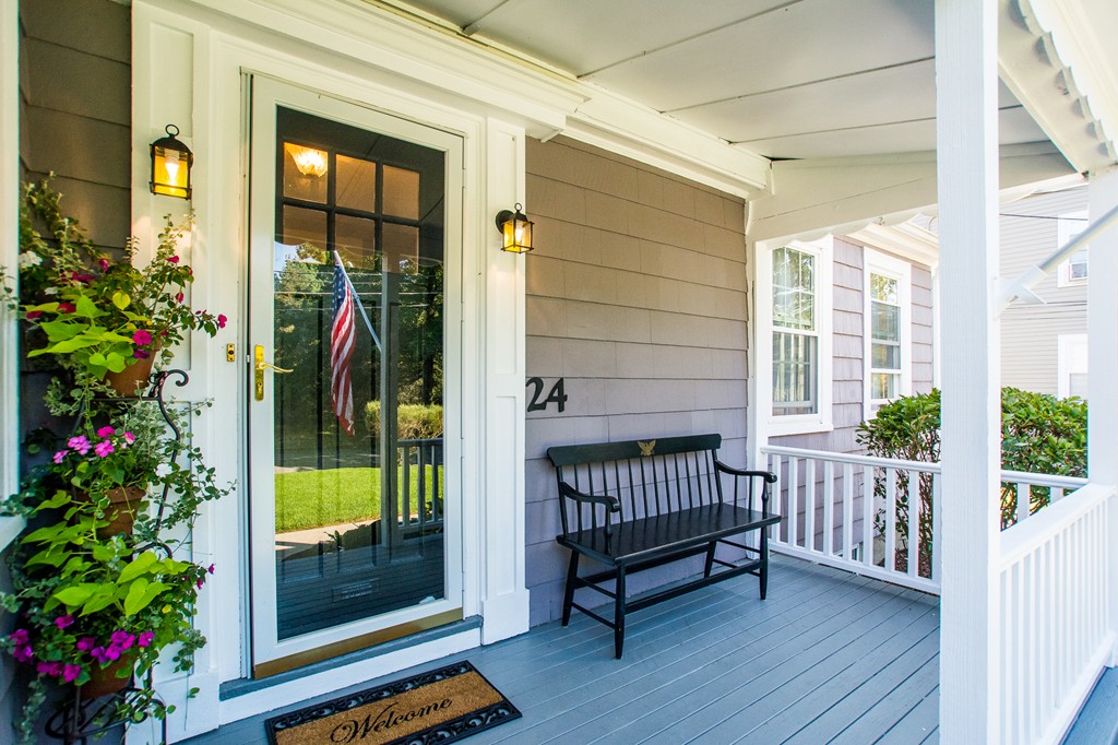24 Murray Road Newton, MA 02465 - Photo 19 of 30 a view of porch with a bench and floor to ceiling window