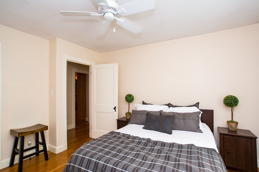 24 Murray Road Newton, MA 02465 - Photo 5 of 30 a bedroom with a bed and window
