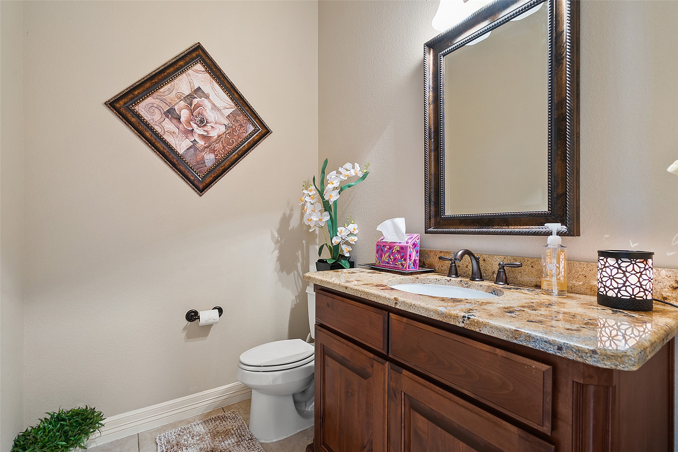1200 Lions Lair Leander, TX 78641 - Photo 19 of 40 a bathroom with a granite countertop toilet sink and mirror