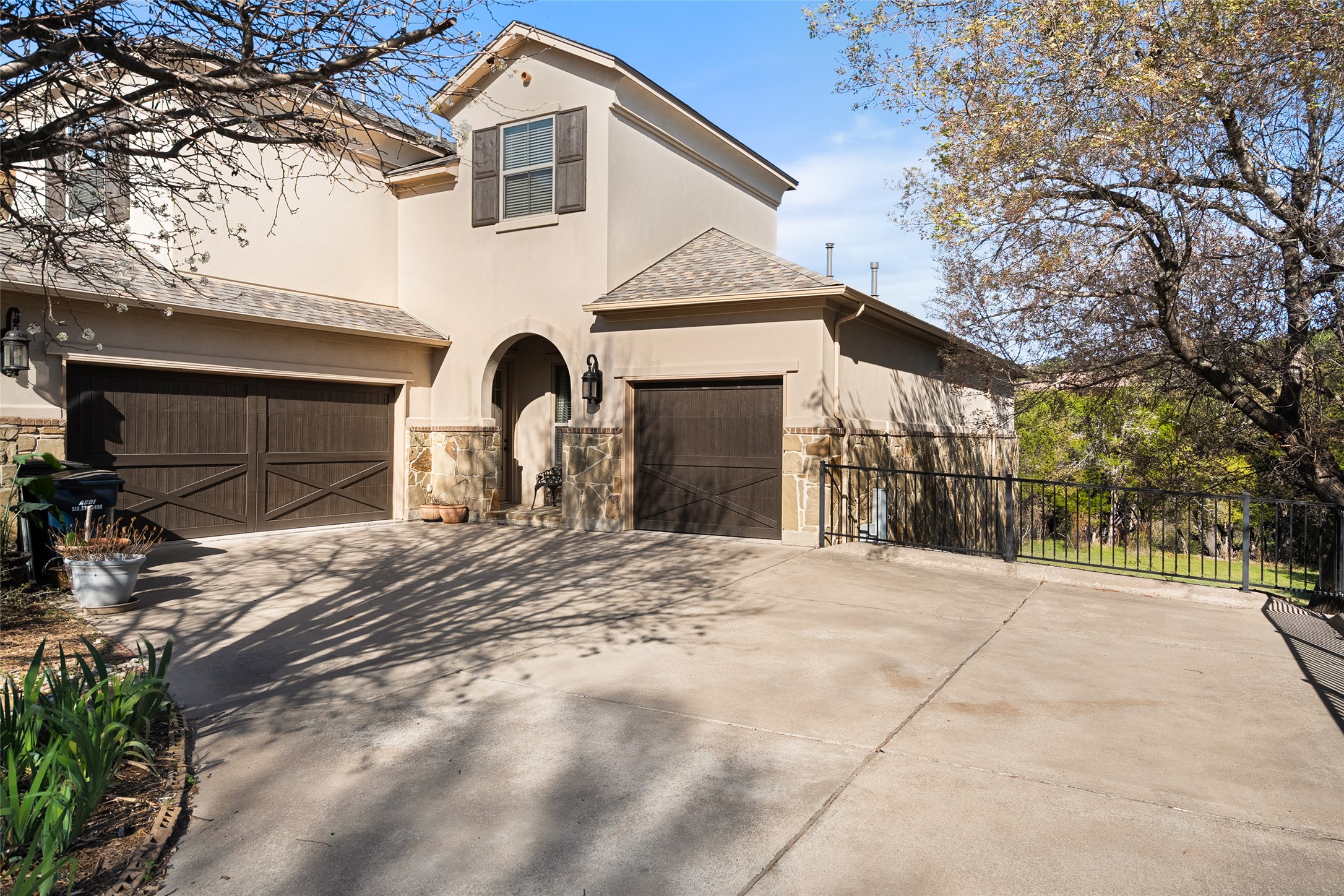 1200 Lions Lair Leander, TX 78641 - Photo 2 of 40 a front view of a house with a yard and garage