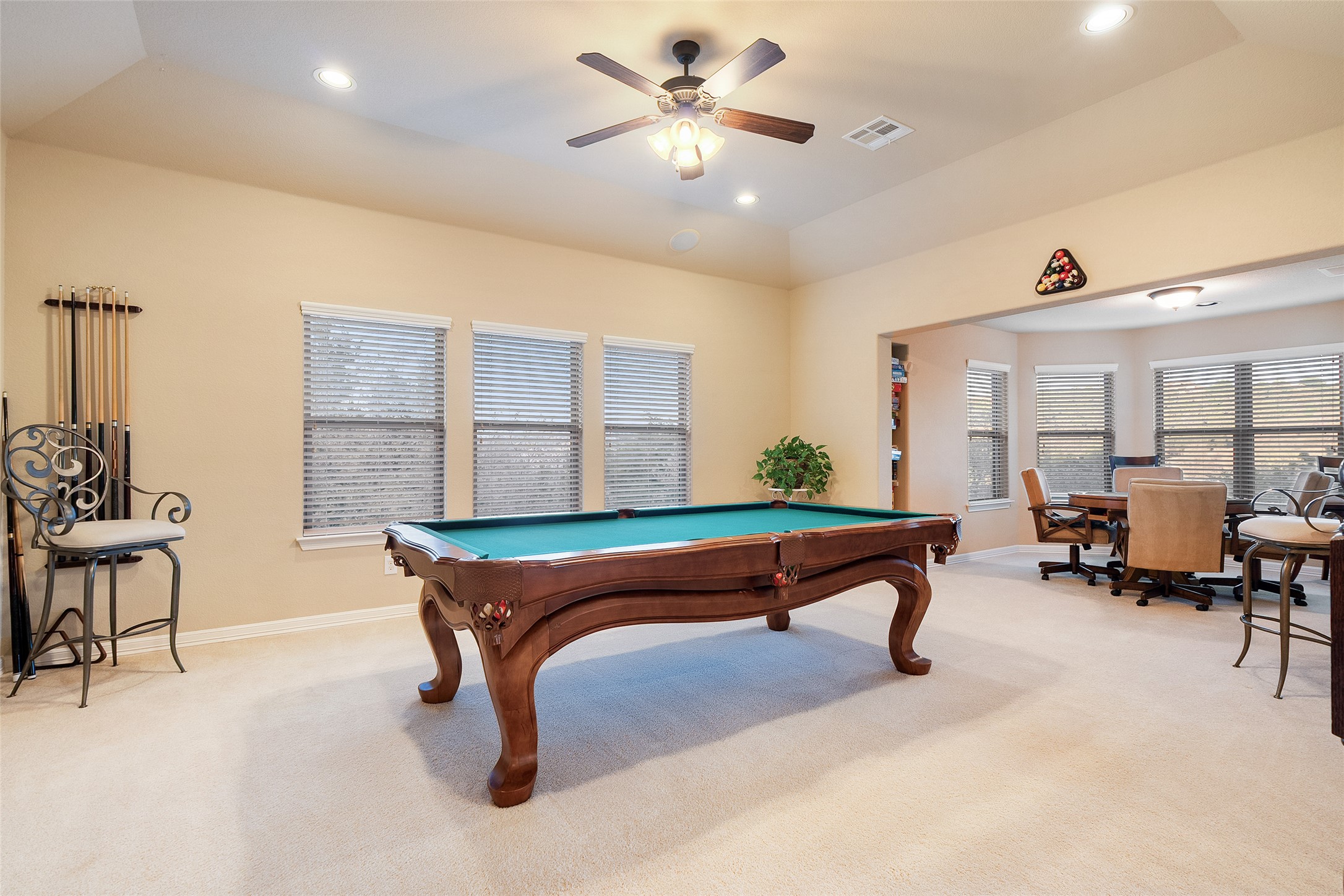 1200 Lions Lair Leander, TX 78641 - Photo 24 of 40 a living room with furniture a table and kitchen appliances