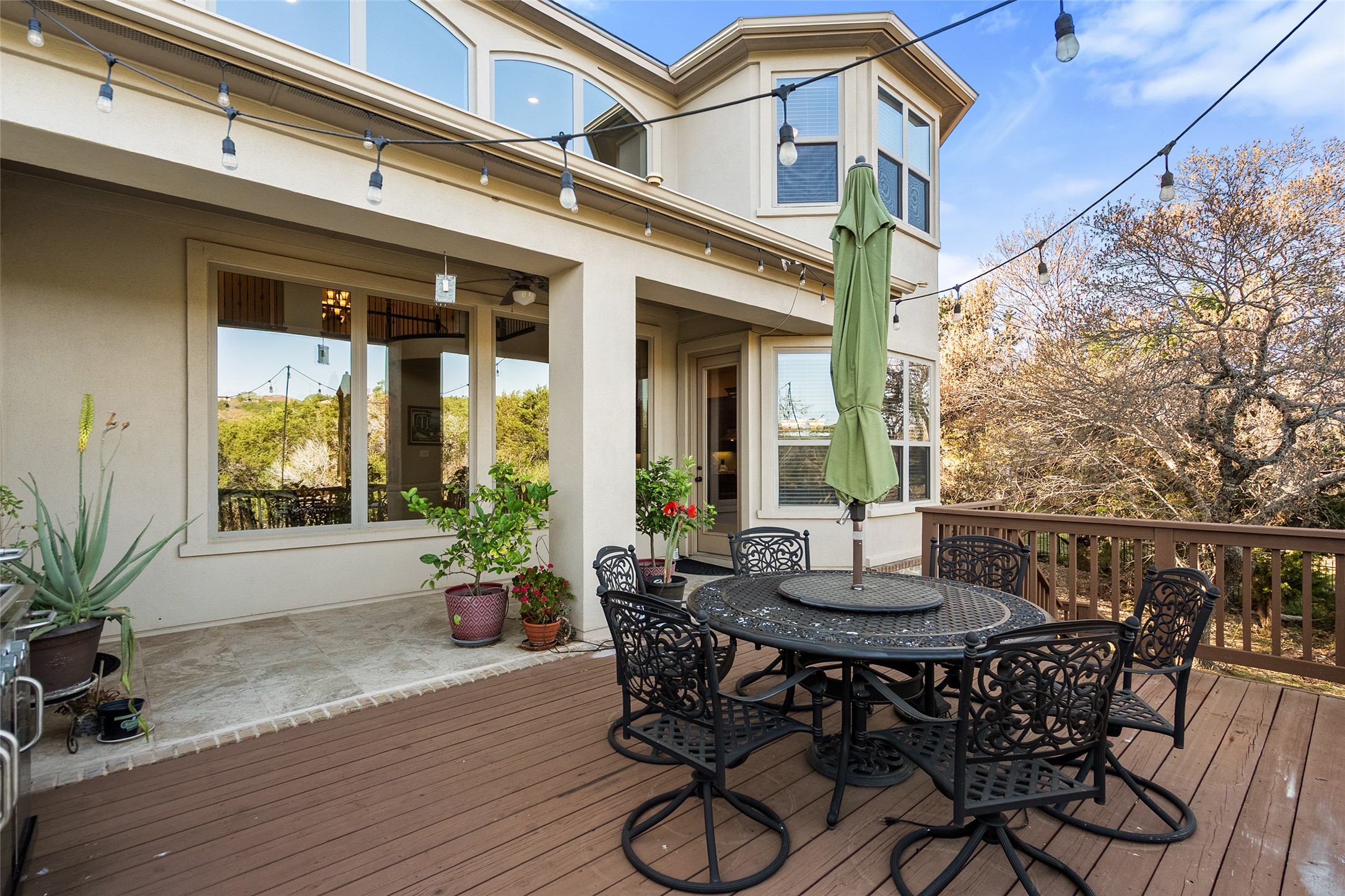 1200 Lions Lair Leander, TX 78641 - Photo 30 of 40 a view of a patio with table and chairs and potted plants