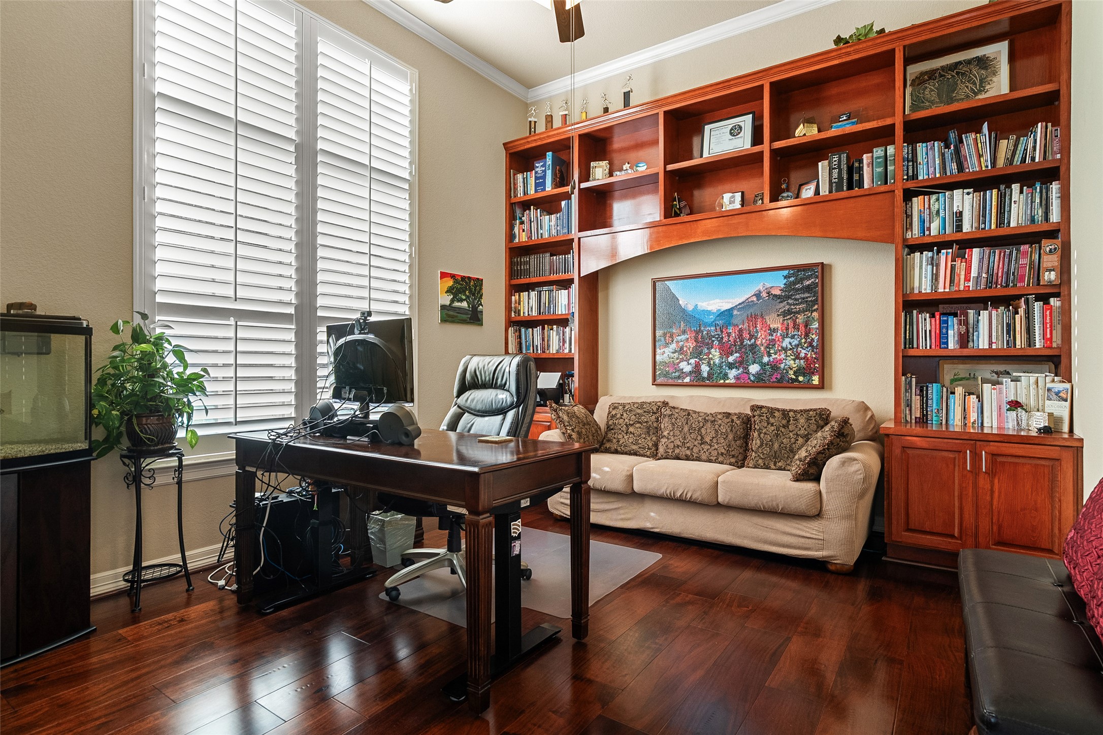 1200 Lions Lair Leander, TX 78641 - Photo 6 of 40 a living room with fireplace furniture and a book shelf