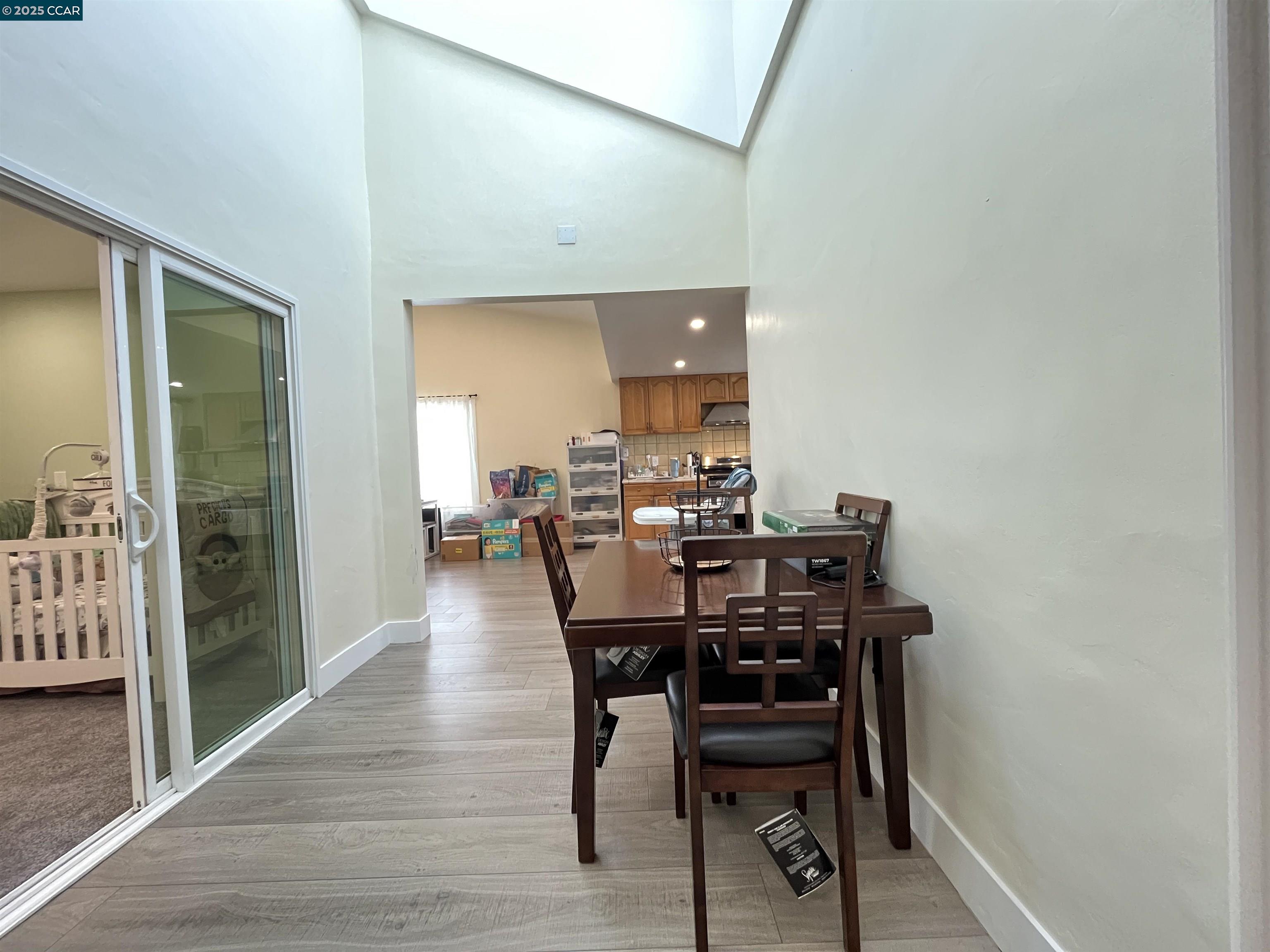 120 Bonita Court Rodeo, CA 94572 - Photo 18 of 49 a view of a dining room with furniture and wooden floor