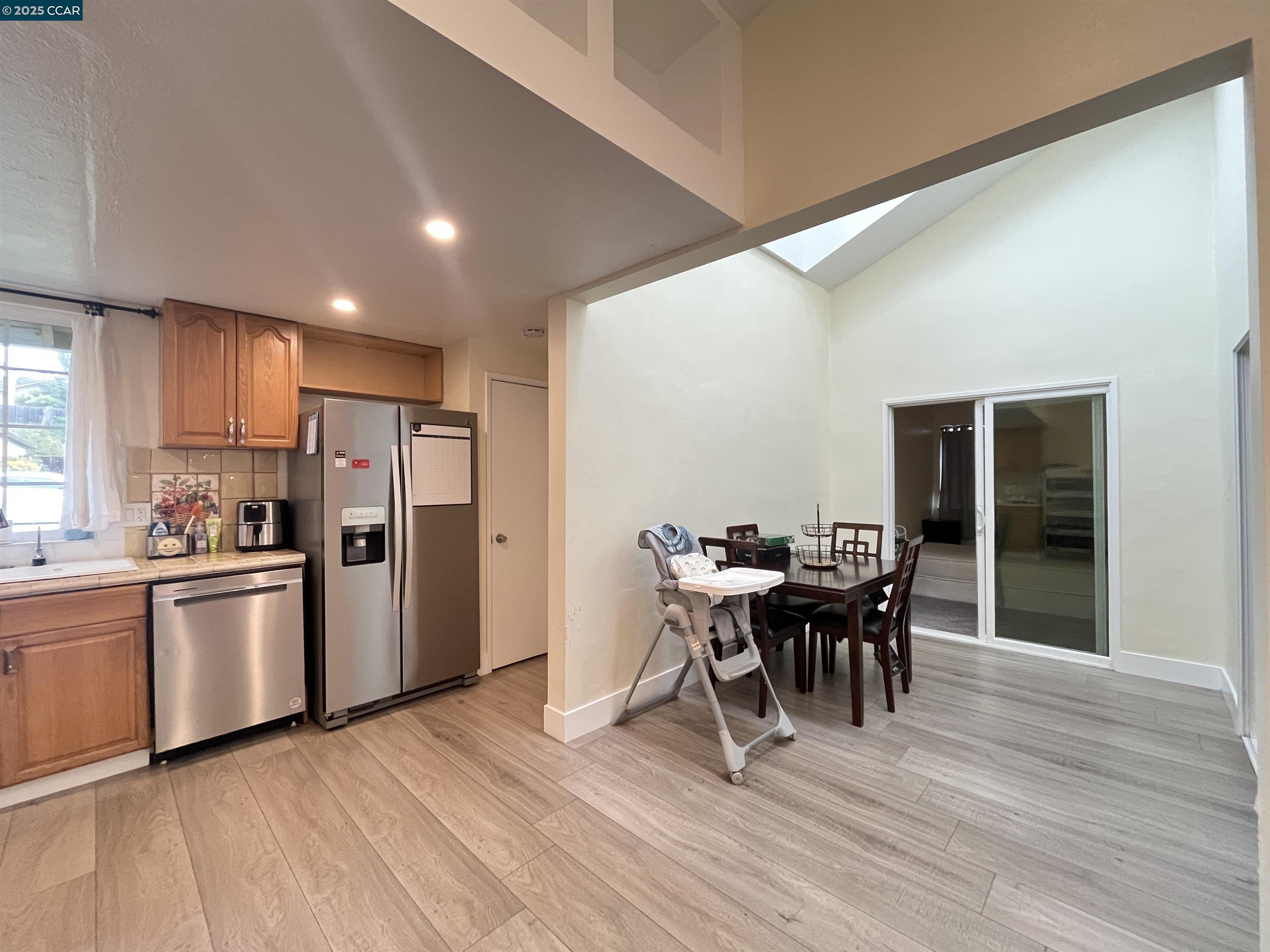 120 Bonita Court Rodeo, CA 94572 - Photo 20 of 49 a view of a dining room with furniture window and wooden floor