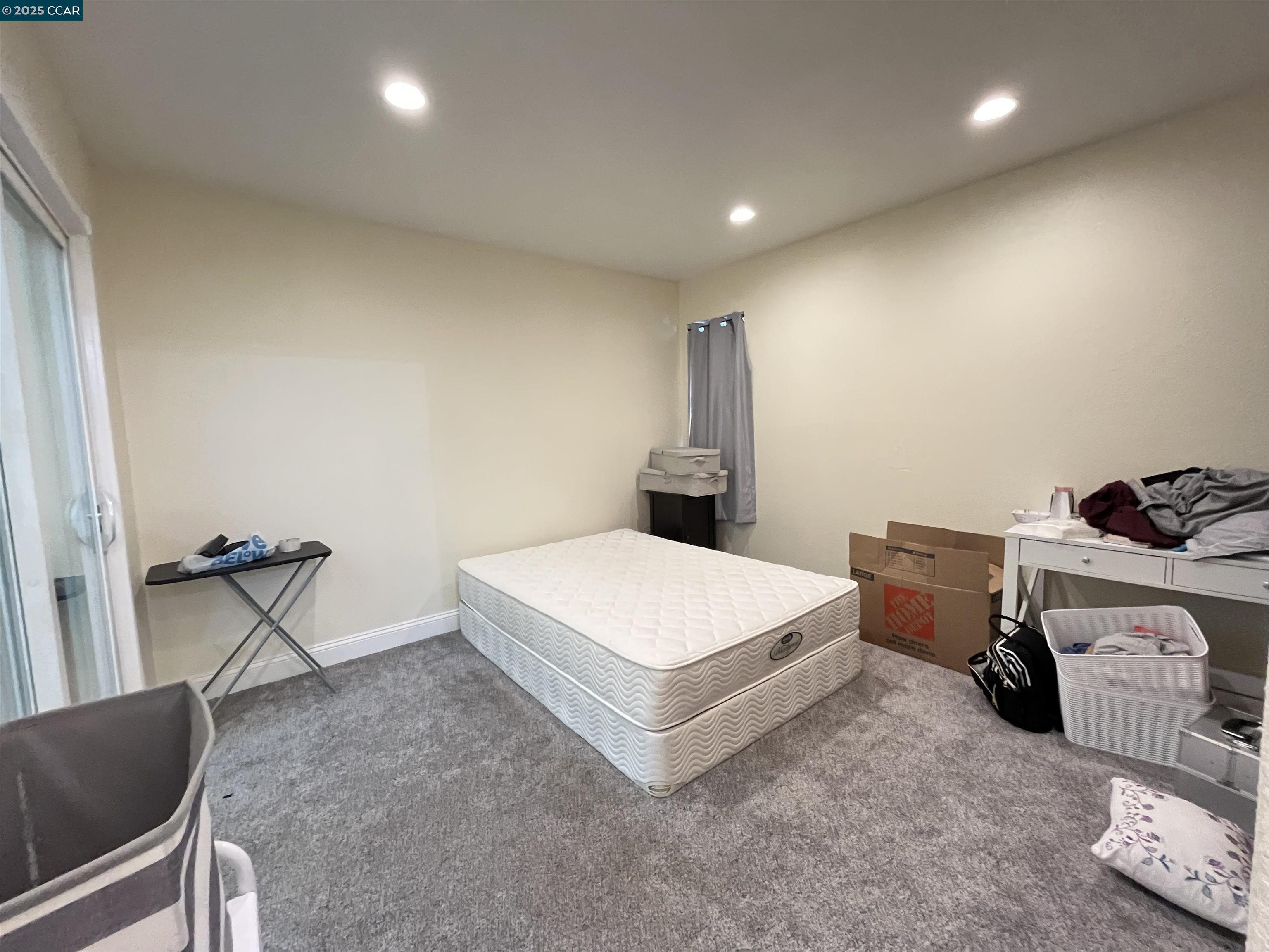 120 Bonita Court Rodeo, CA 94572 - Photo 27 of 49 a living room with furniture and a table