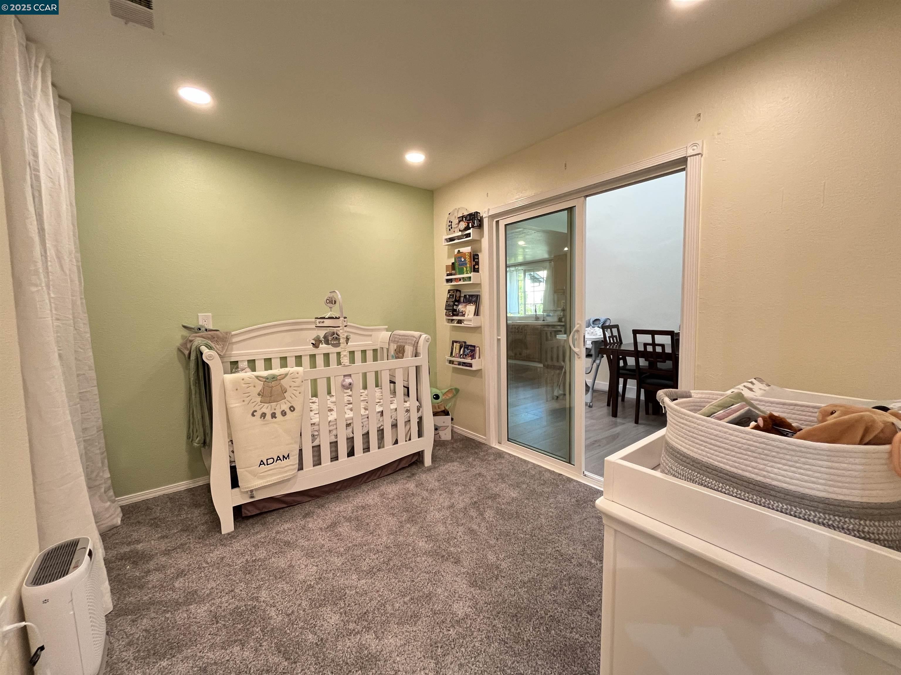 120 Bonita Court Rodeo, CA 94572 - Photo 30 of 49 a bed room with a bed and a couch