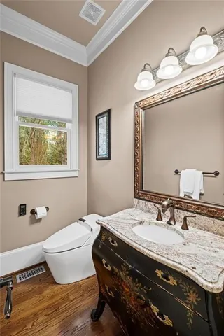 an aerial view of a house with swimming pool garden and patio