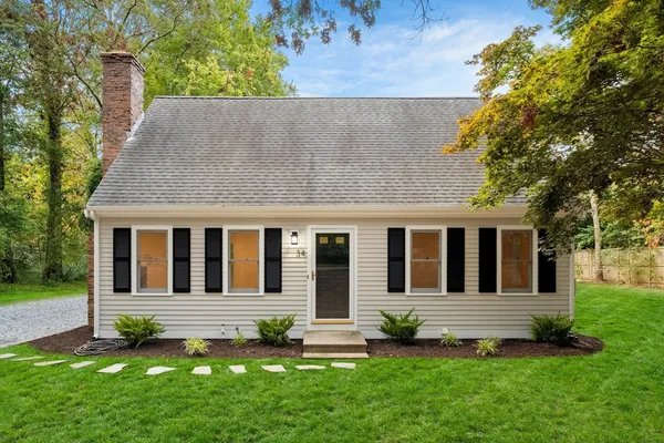 a house view with a garden space