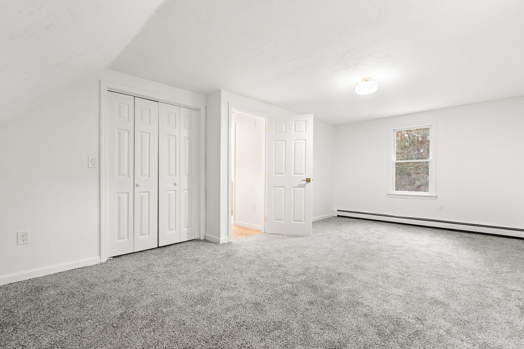 34 Saddleback Road Mashpee, MA 02649 - Photo 15 of 24 an empty room with windows