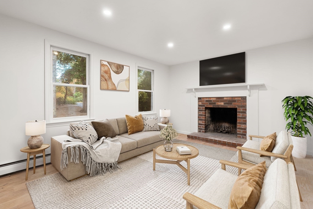 34 Saddleback Road Mashpee, MA 02649 - Photo 6 of 24 a living room with furniture fireplace and window