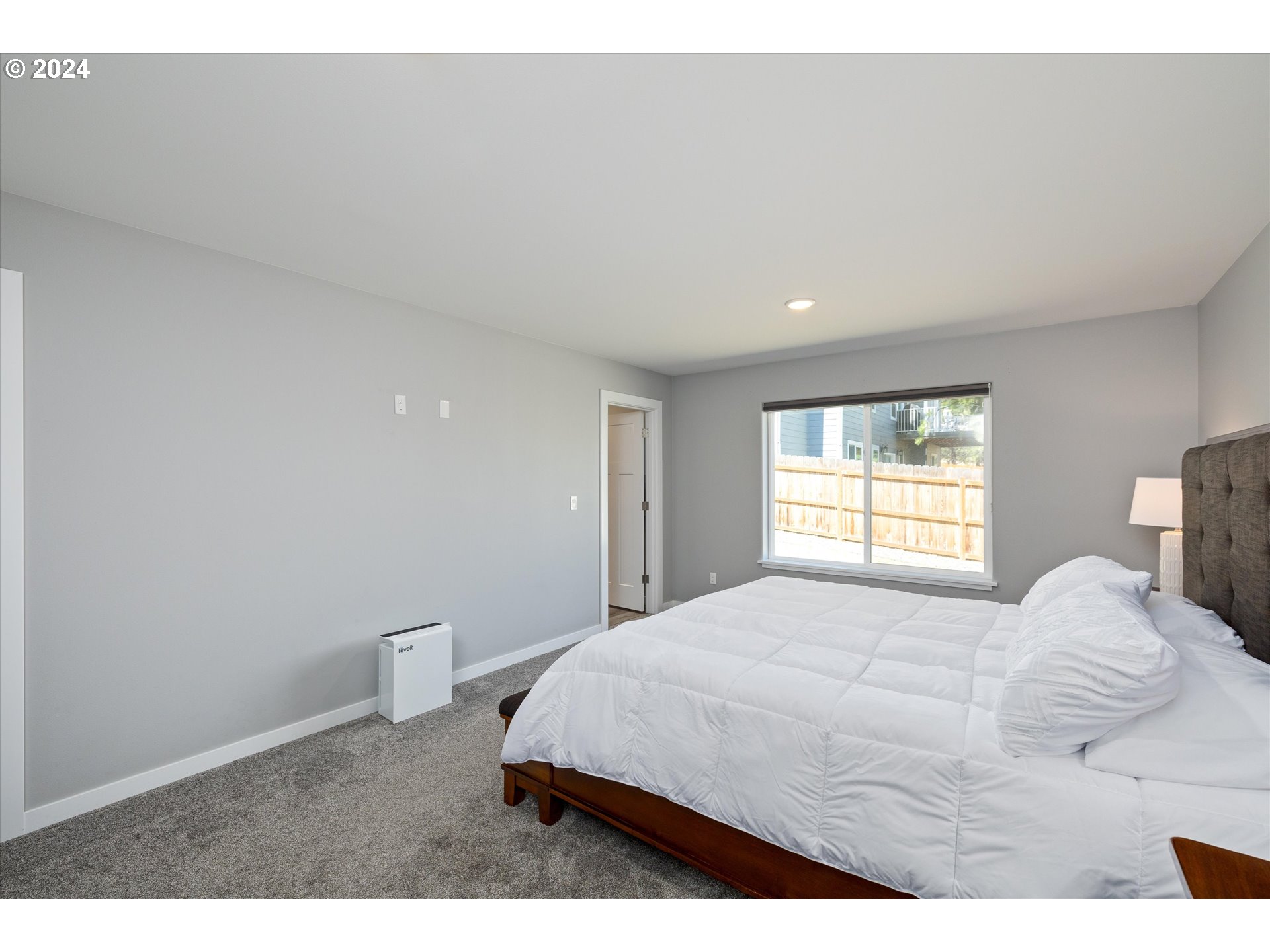 1489 Elberta Street West The Dalles, OR 97058 - Photo 13 of 29 a bedroom with a bed and a window