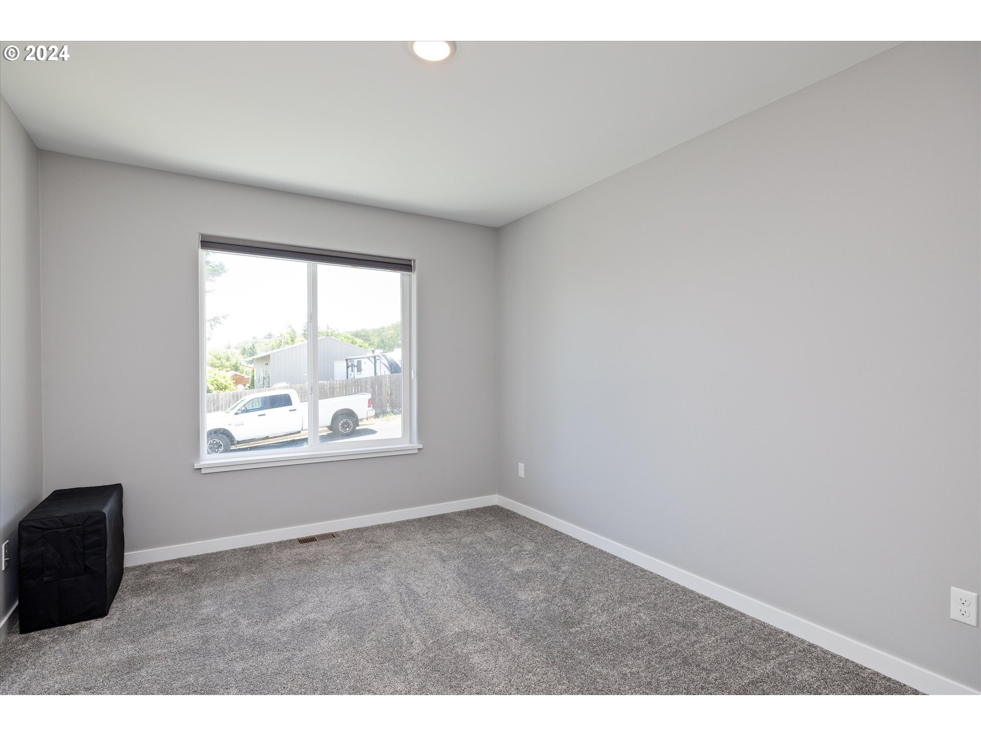 1489 Elberta Street West The Dalles, OR 97058 - Photo 18 of 29 an empty room with windows