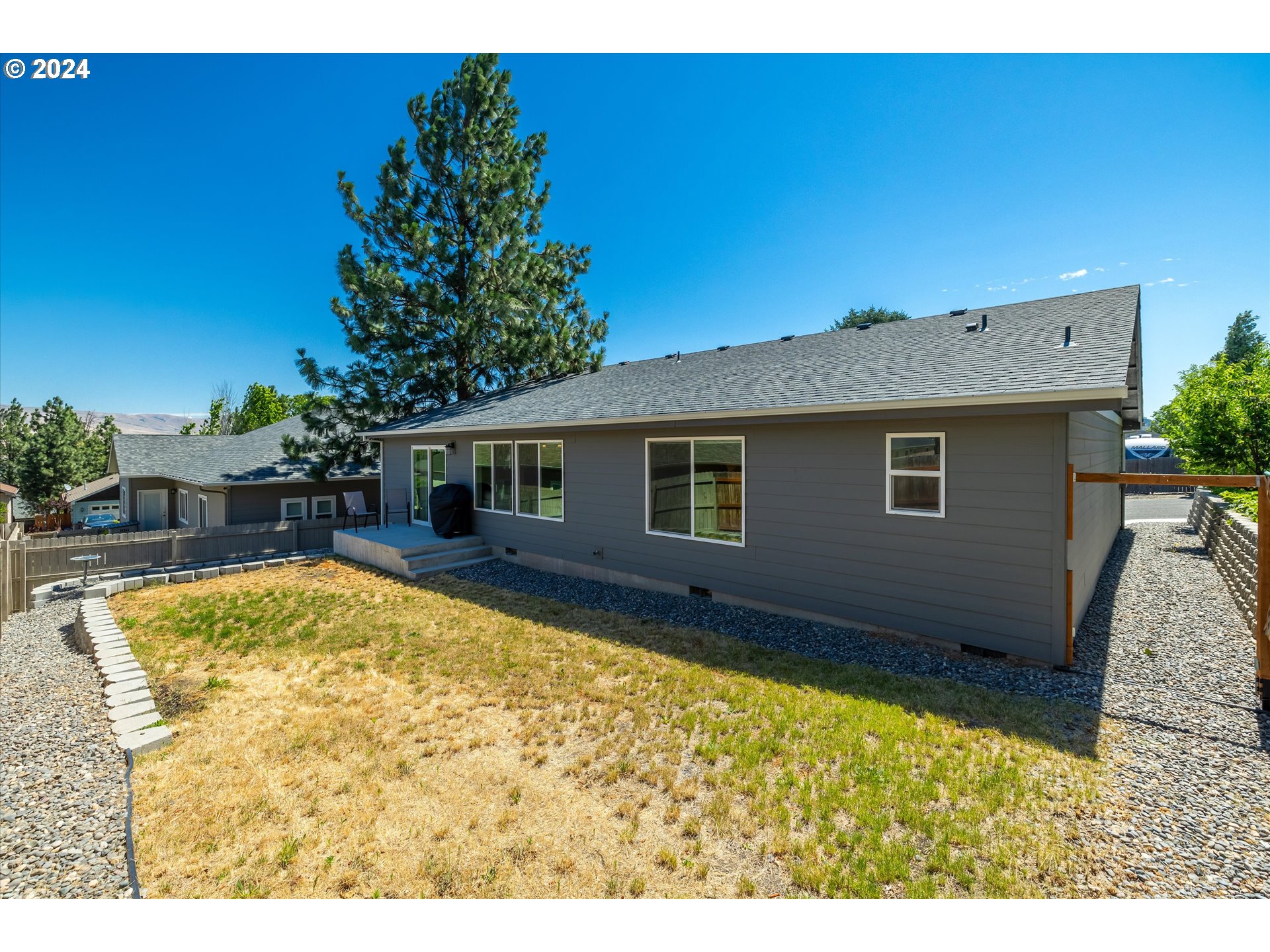 1489 Elberta Street West The Dalles, OR 97058 - Photo 24 of 29 a view of outdoor space yard and swimming pool