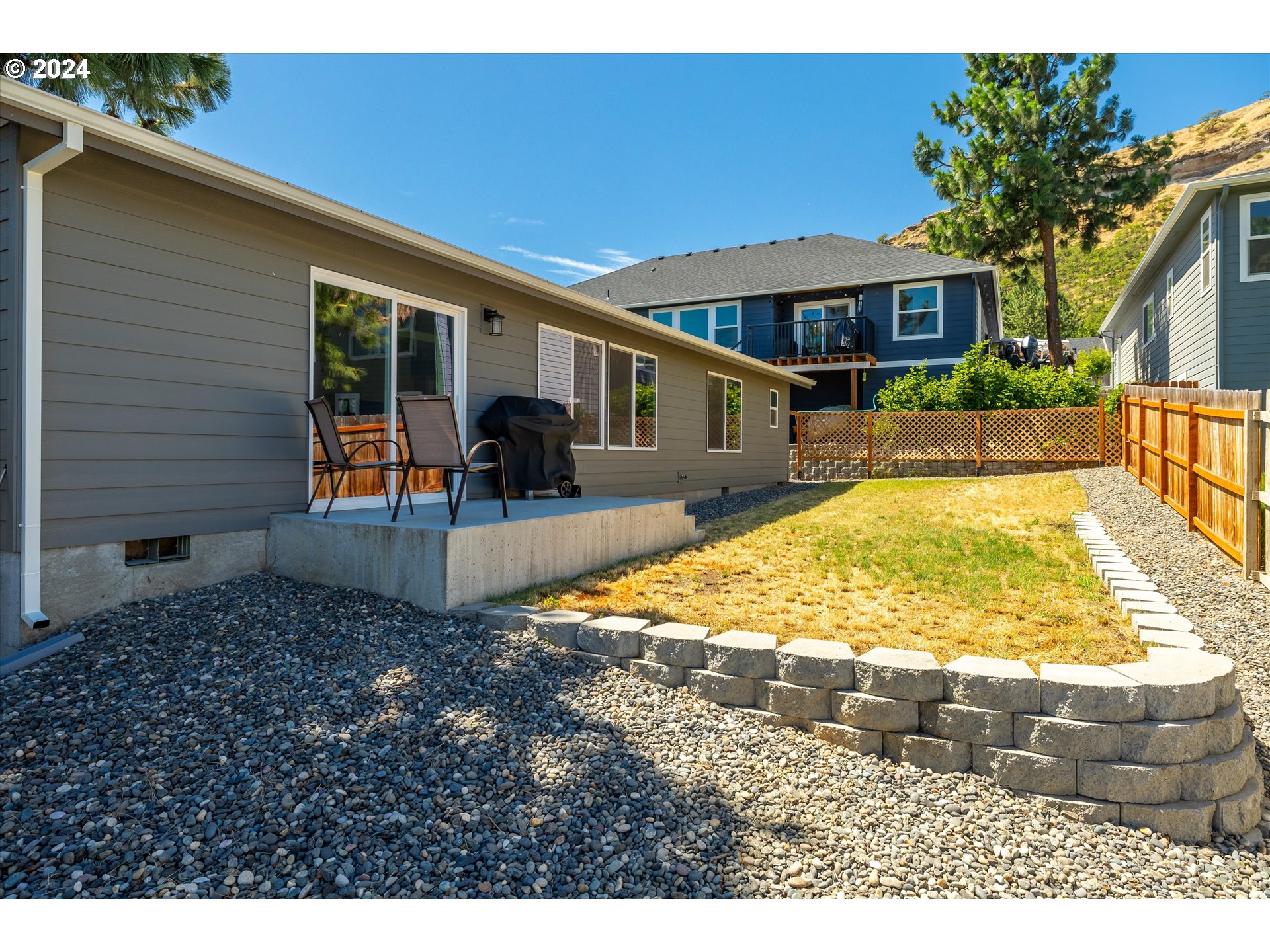 1489 Elberta Street West The Dalles, OR 97058 - Photo 26 of 29 a view of a house with swimming pool