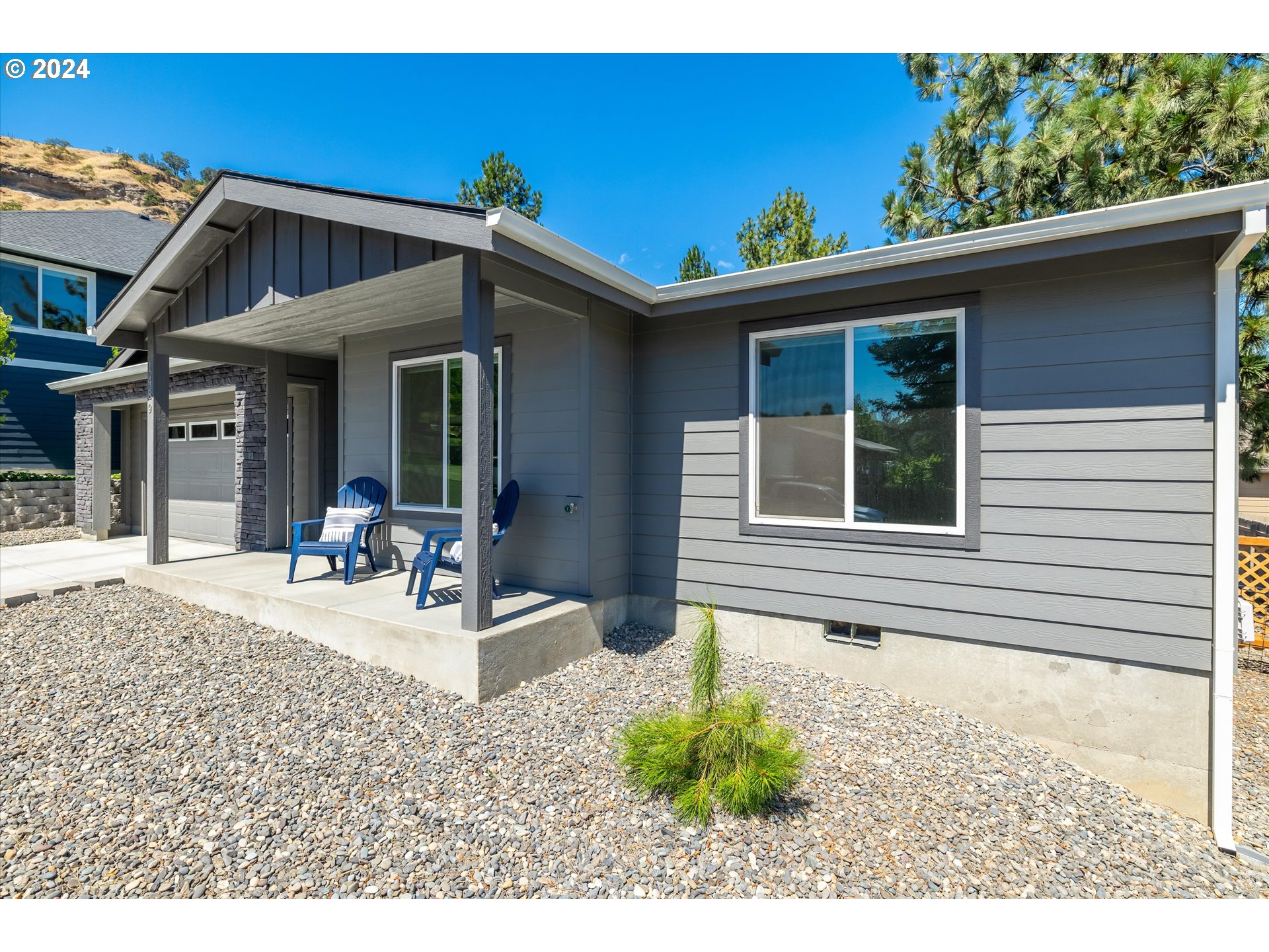1489 Elberta Street West The Dalles, OR 97058 - Photo 28 of 29 a view of a house with a patio