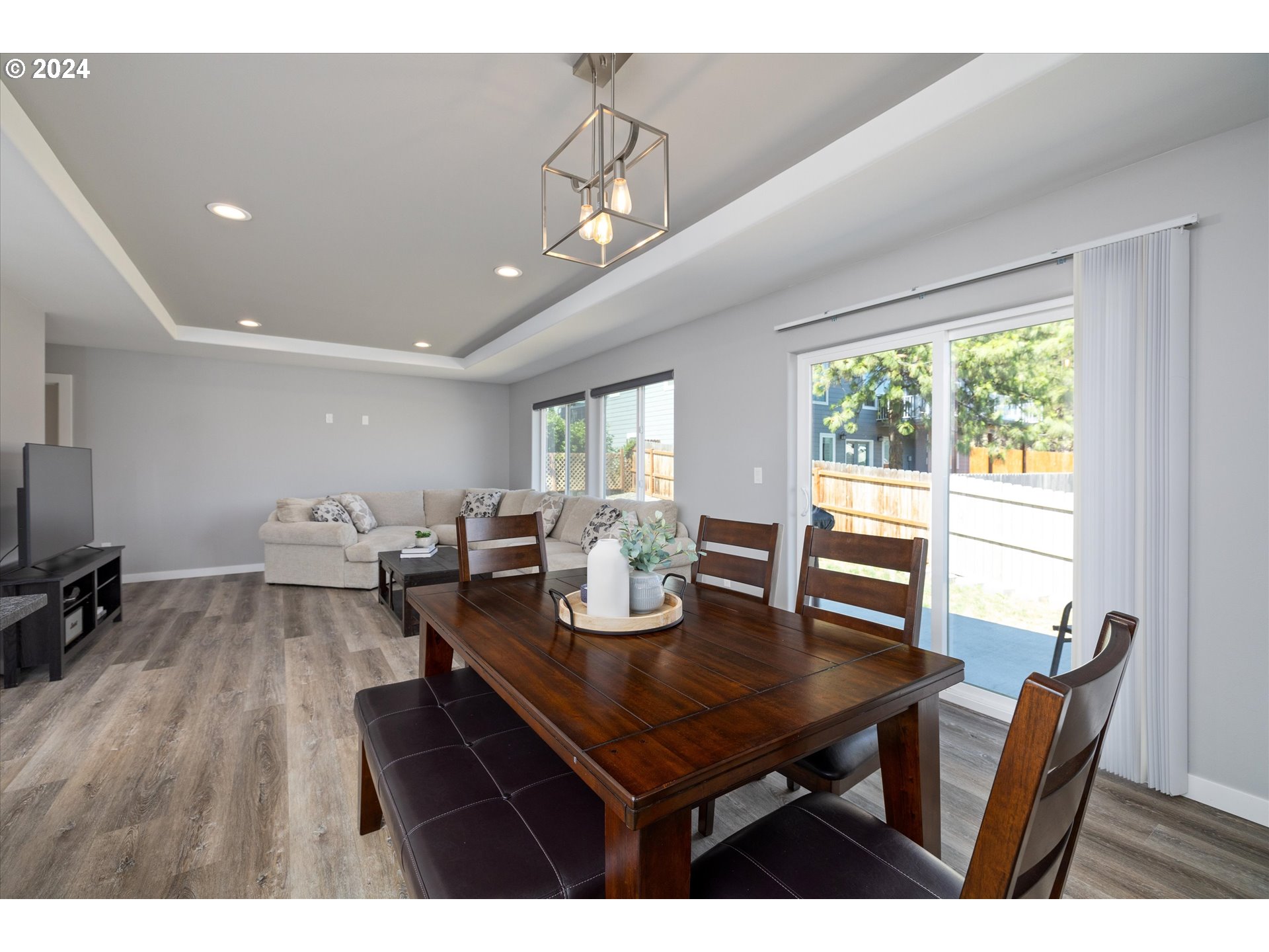 1489 Elberta Street West The Dalles, OR 97058 - Photo 10 of 29 a view of a dining room with furniture and wooden floor