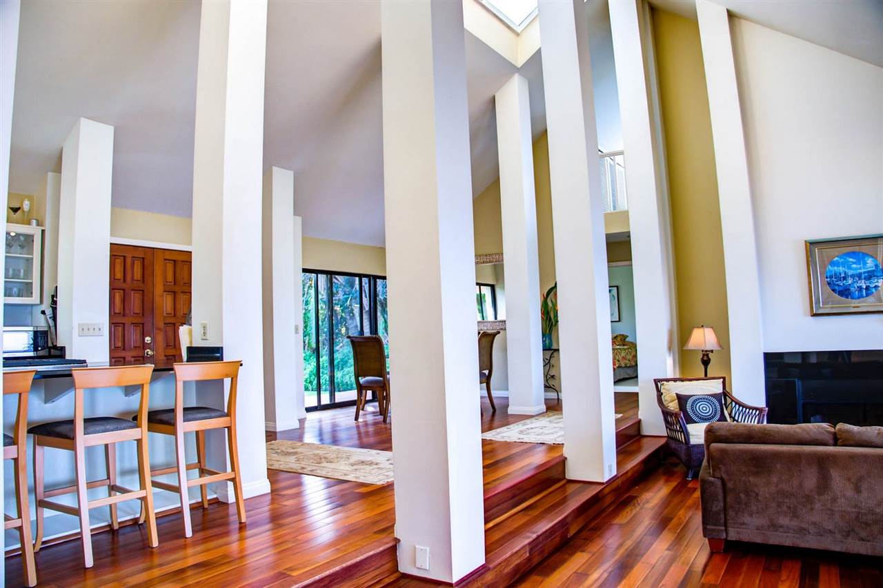 311 Door Of Faith Road Haiku, HI 96708 - Photo 12 of 30 a living room with furniture and a fireplace