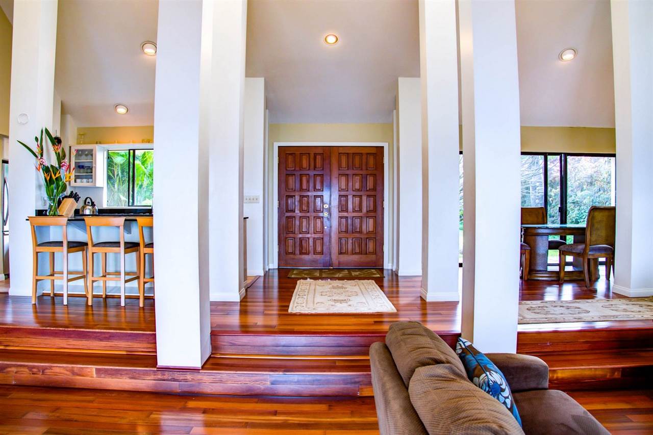 311 Door Of Faith Road Haiku, HI 96708 - Photo 13 of 30 a living room with furniture and a potted plant