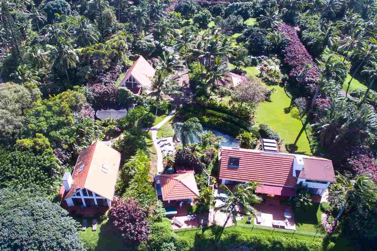 311 Door Of Faith Road Haiku, HI 96708 - Photo 2 of 30 an aerial view of a house with a yard and a large tree