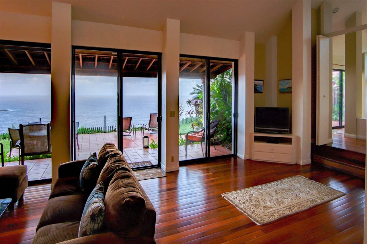311 Door Of Faith Road Haiku, HI 96708 - Photo 6 of 30 a living room with furniture and a table