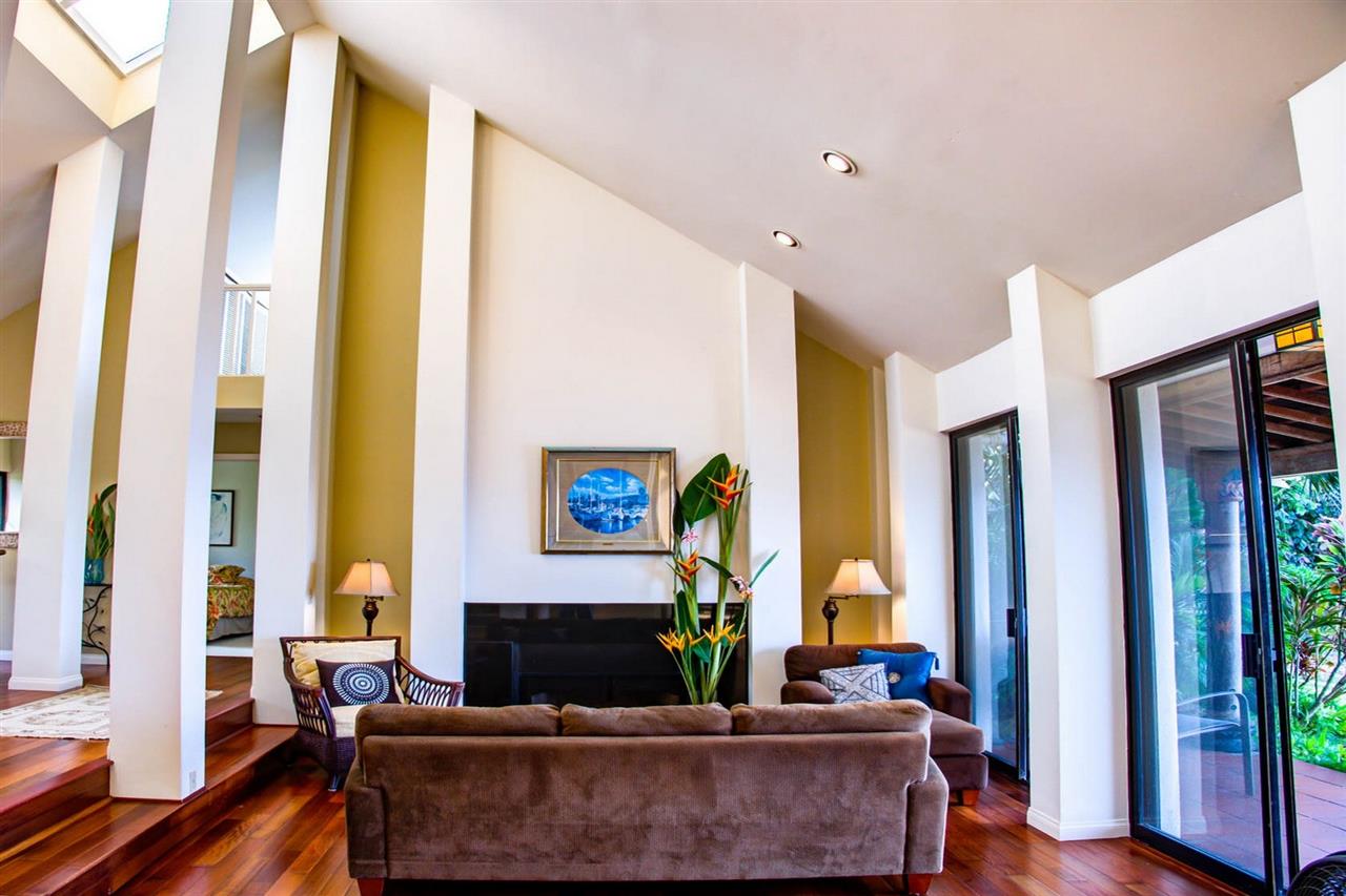 311 Door Of Faith Road Haiku, HI 96708 - Photo 8 of 30 a living room with furniture and a large window