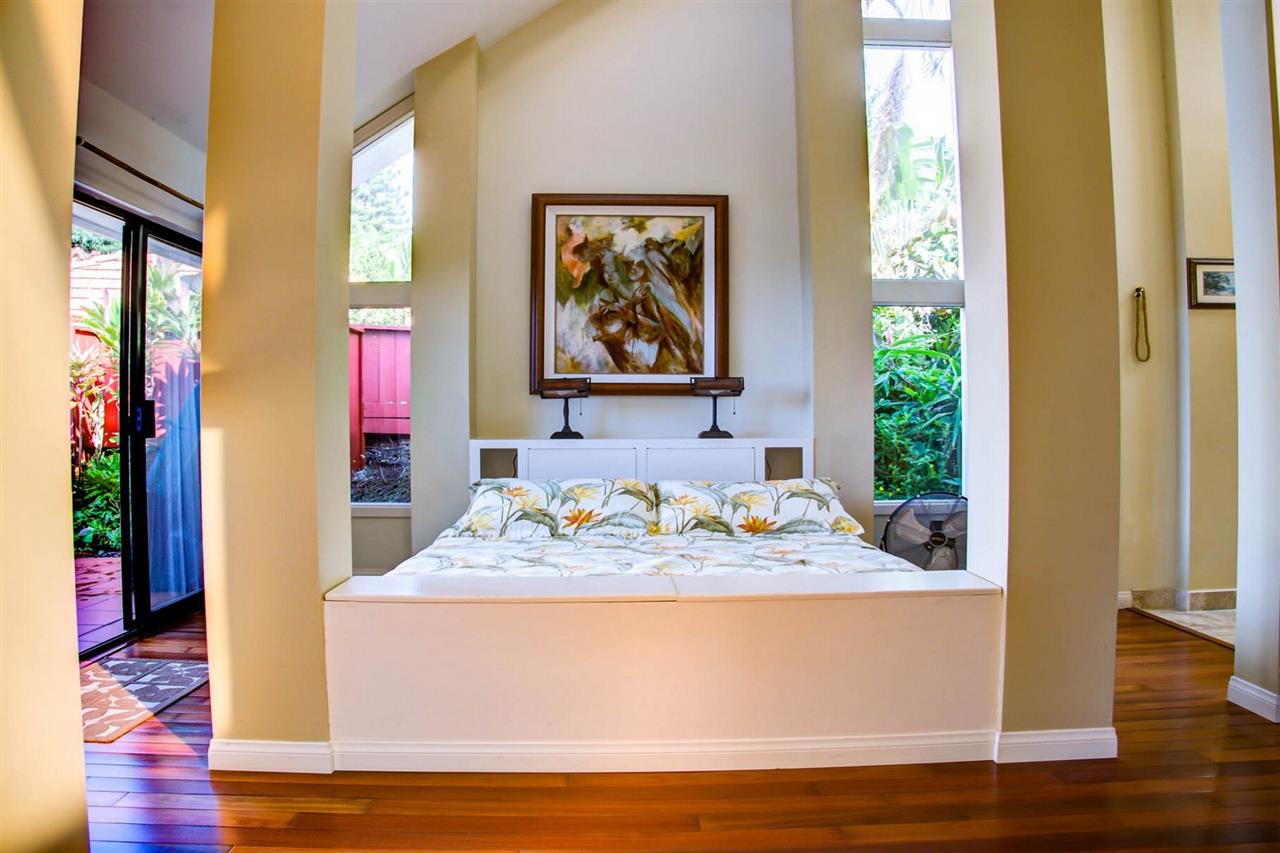 311 Door Of Faith Road Haiku, HI 96708 - Photo 9 of 30 a view of living room with wooden floor and window