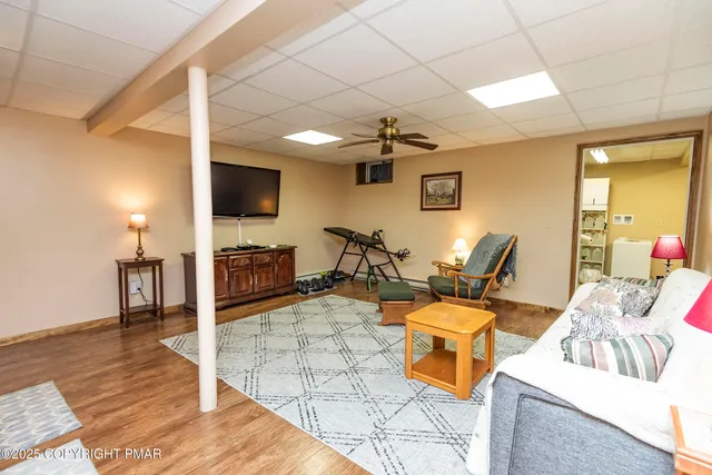 an aerial view of a house with swimming pool
