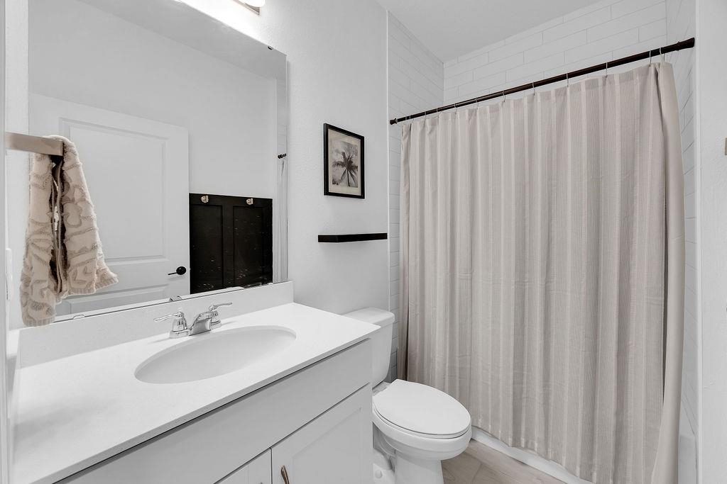 161 Goldcrest Way St. Augustine, FL 32092 - Photo 21 of 52 a bathroom with a sink and a mirror