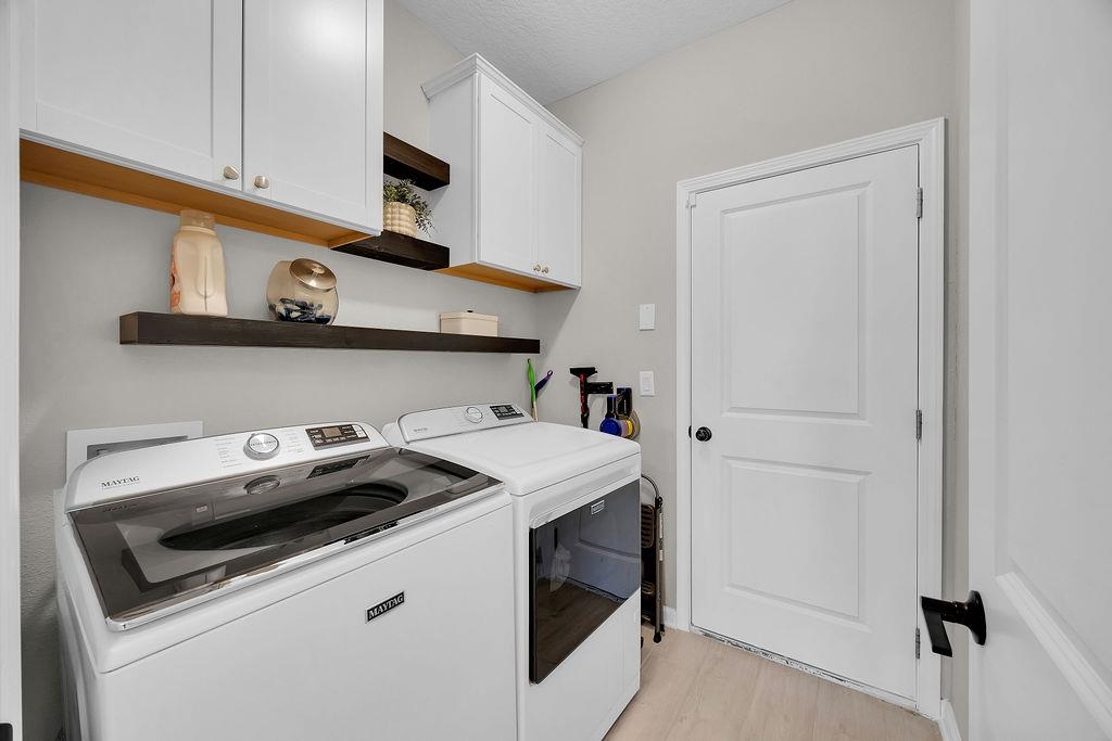 161 Goldcrest Way St. Augustine, FL 32092 - Photo 31 of 52 a utility room with dryer and washer