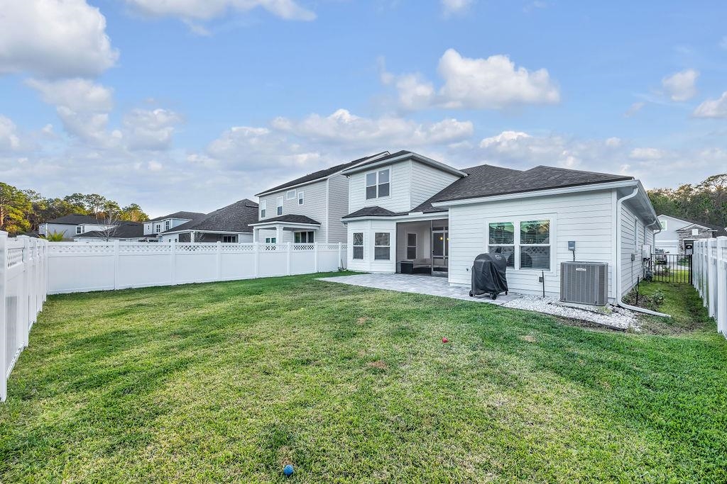 161 Goldcrest Way St. Augustine, FL 32092 - Photo 34 of 52 a view of a house with a yard and sitting area