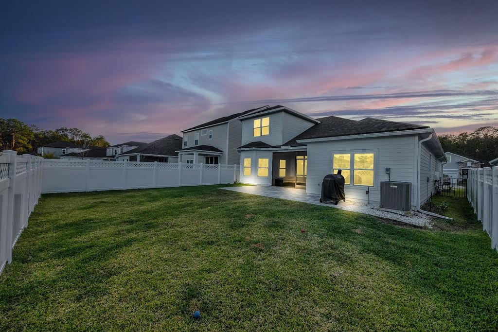161 Goldcrest Way St. Augustine, FL 32092 - Photo 47 of 52 a front view of a house with a yard