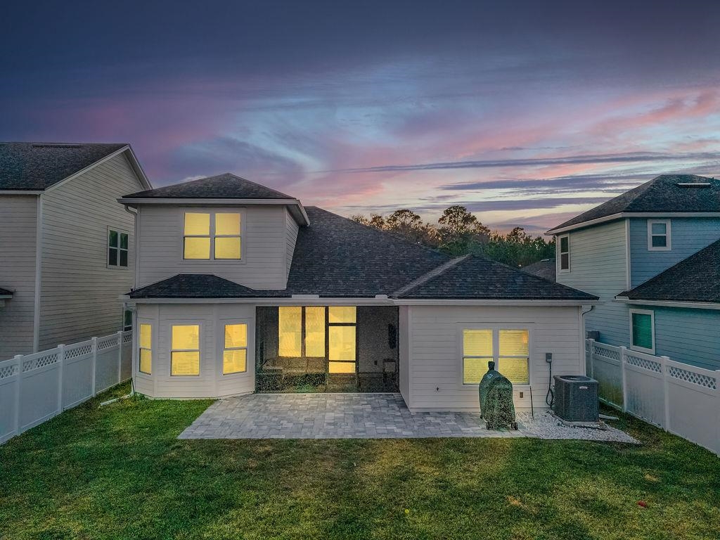 161 Goldcrest Way St. Augustine, FL 32092 - Photo 48 of 52 a front view of a house with a yard