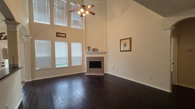 a view of a livingroom with wooden floor