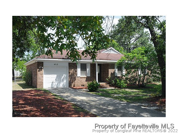4513 Ruby Road Fayetteville, NC 28311 - Photo 1 of 10 a view of a house with a yard