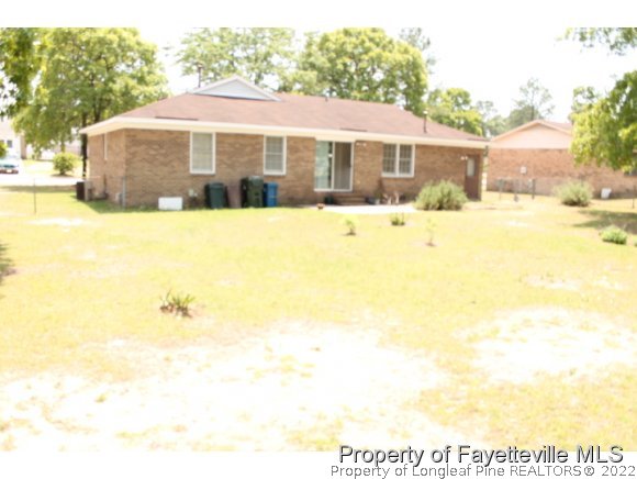 4513 Ruby Road Fayetteville, NC 28311 - Photo 3 of 10 a view of house with yard outdoor seating and barbeque oven