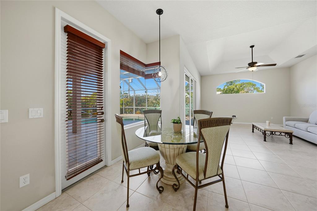 5455 Graves Terrace Port Charlotte, FL 33981 - Photo 17 of 54 a view of a dining room with furniture window and outside view