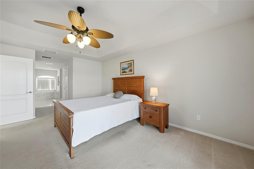 5455 Graves Terrace Port Charlotte, FL 33981 - Photo 21 of 54 a bedroom with a bed and window