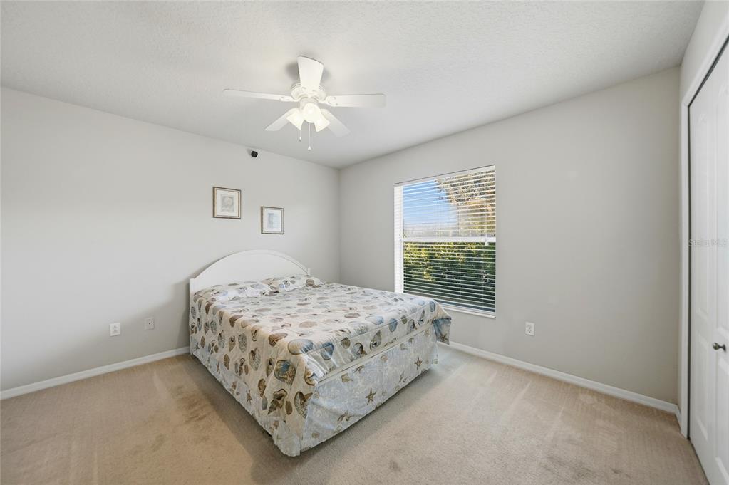 5455 Graves Terrace Port Charlotte, FL 33981 - Photo 29 of 54 a bedroom with a bed and window
