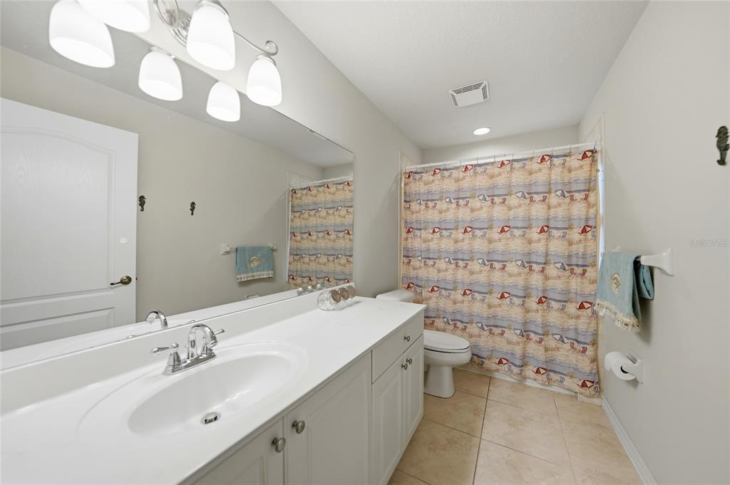5455 Graves Terrace Port Charlotte, FL 33981 - Photo 33 of 54 a bathroom with a sink a toilet and shower
