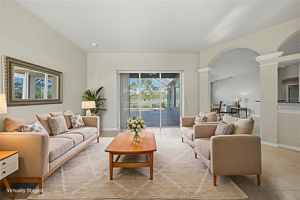 5455 Graves Terrace Port Charlotte, FL 33981 - Photo 4 of 54 a living room with furniture and a large window